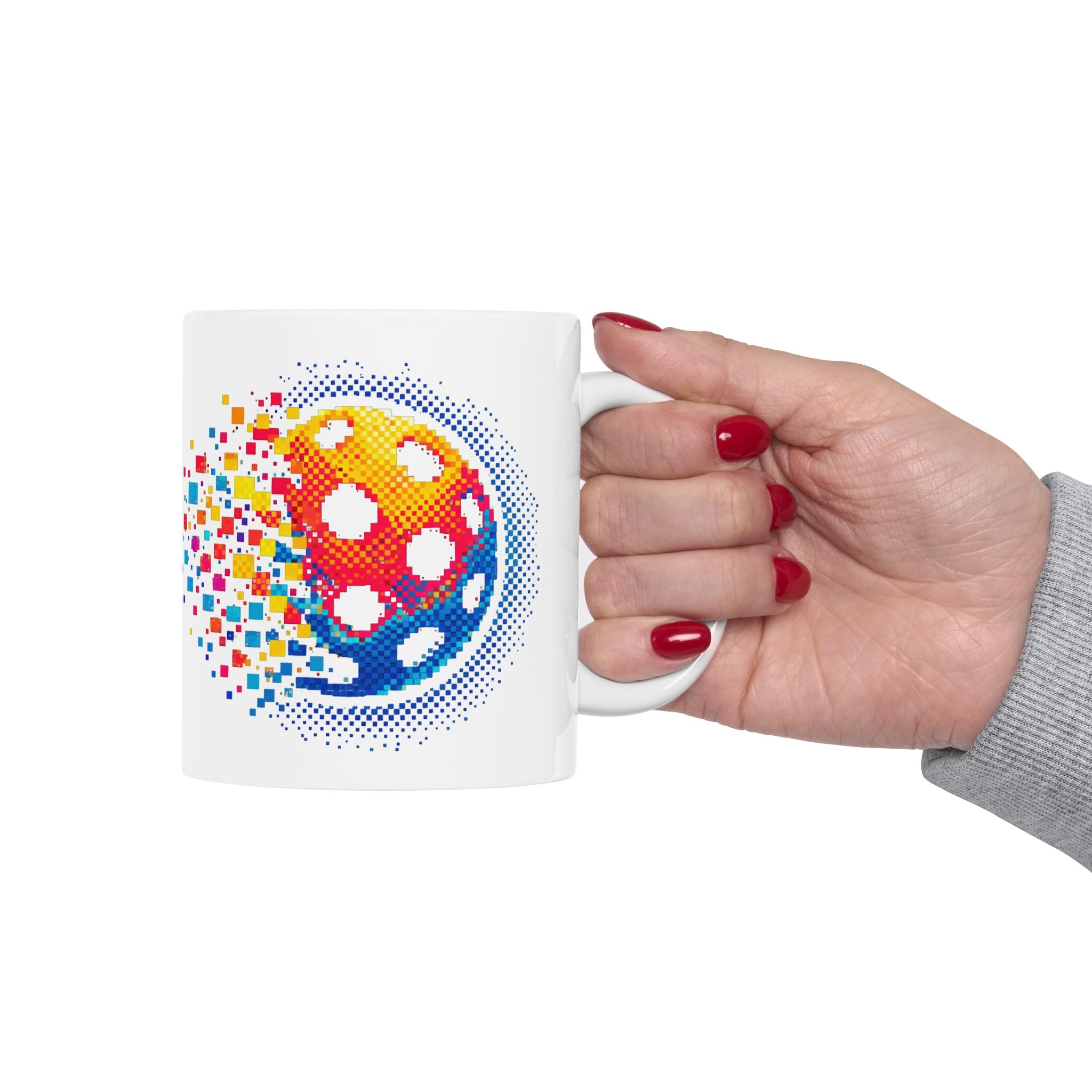 Ceramic mug featuring a pixelated pickleball design with retro exploding graphics, available in 11oz and 15oz sizes.