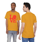 Bright red LOVE Pickleball graphic T-shirt featuring bold pop art design, casual unisex style, printed by Printify.
