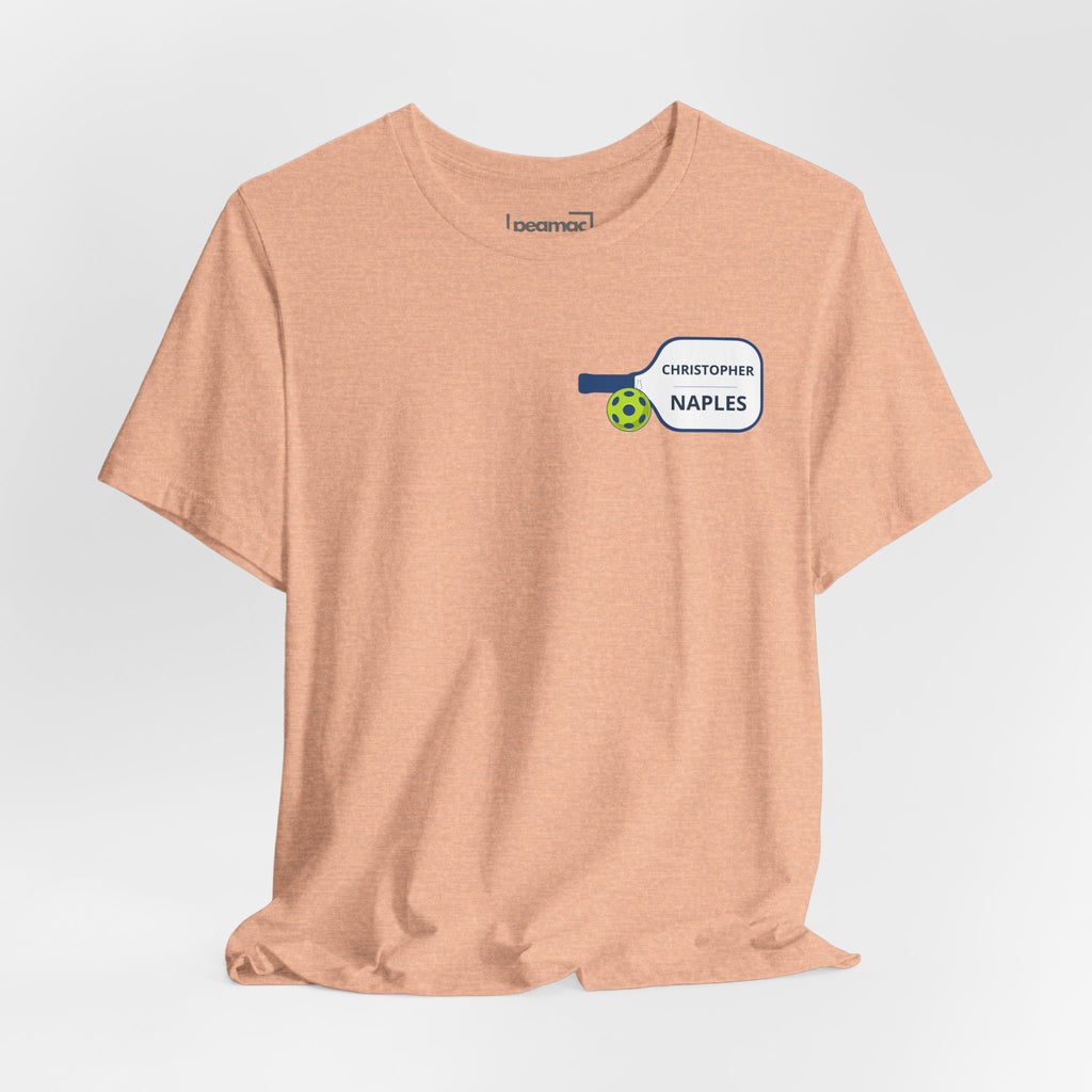 Personalized pickleball T-shirt with custom name and club paddle graphic, made by Printify, featuring vibrant design on cotton fabric.
