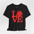 Red LOVE Pickleball graphic T-shirt by Printify featuring bold pop art design on a casual cotton tee.