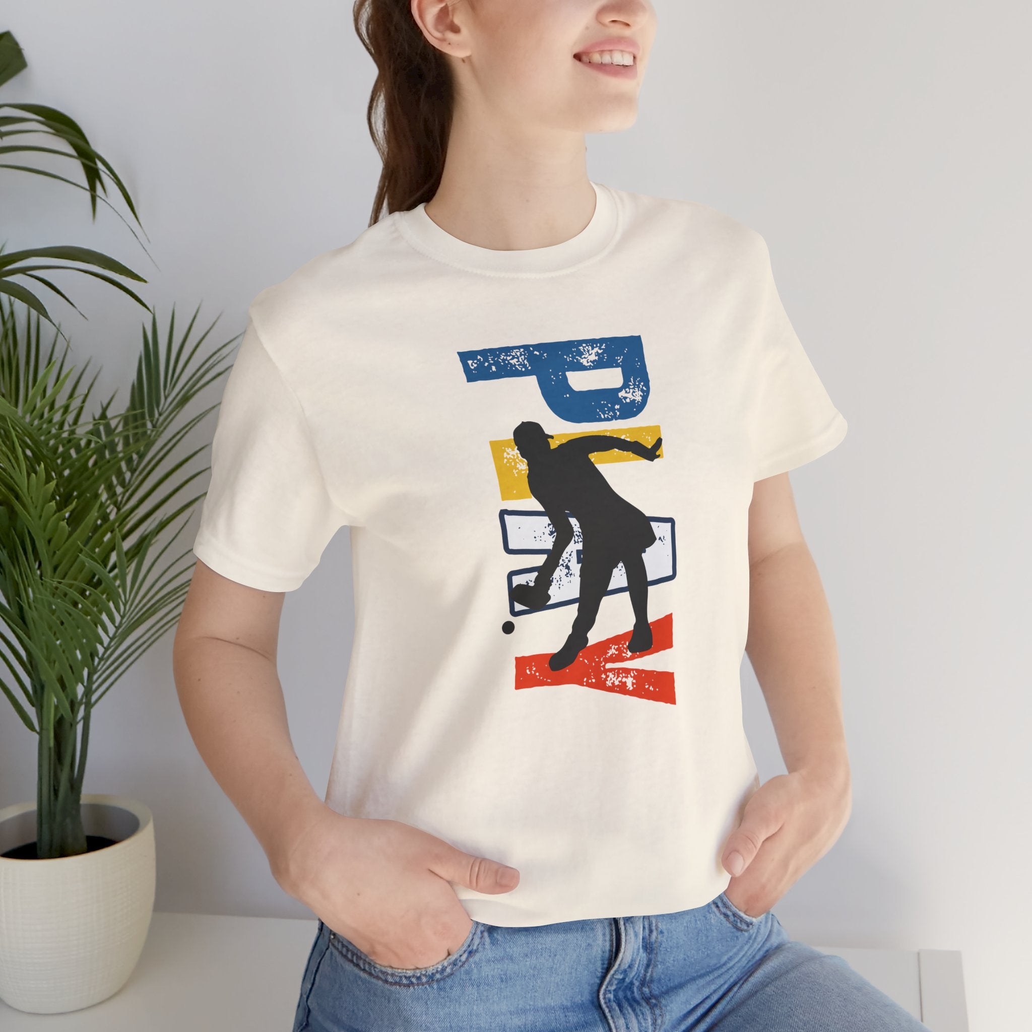 Women's retro-inspired pickleball T-shirt with vertical 'PICKLEBALL' back print, by Printify, casual athletic wear.