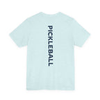 Women's retro-inspired pickleball T-shirt with vertical back print, casual athletic tee by Printify featuring bold "PICKLEBALL" lettering.