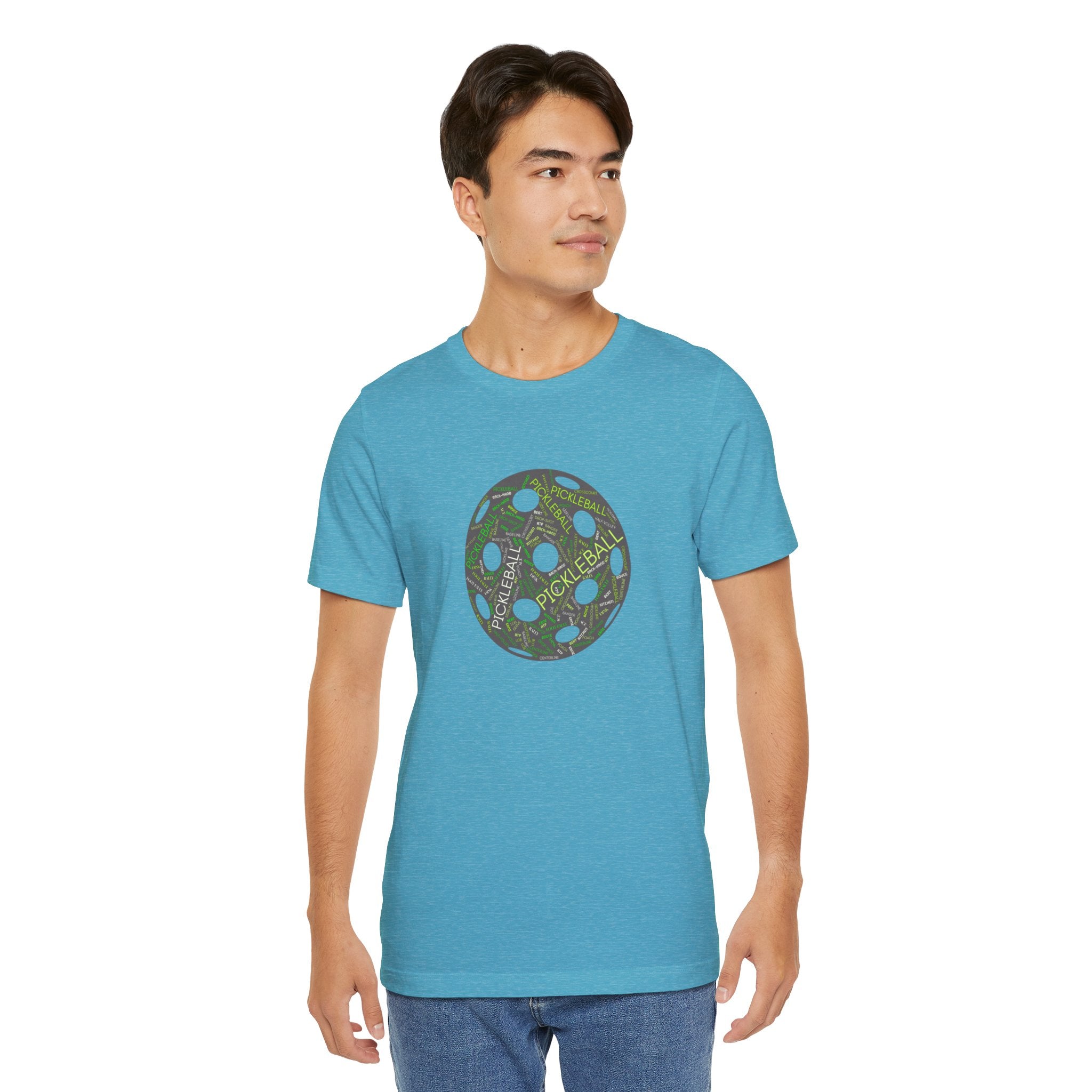 Pickleball Word Cloud T-shirt with pickleball-shaped graphic, featuring words like dink, pickle, and kitchen, by Printify.
