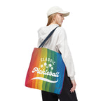 Colorful rainbow pickleball tote bag with crossed paddles and script design, perfect for sports and casual use.