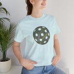Pickleball Word Cloud T-Shirt with pickleball-shaped graphic, featuring words like Dink, Pickle, and Kitchen, on a casual tee.