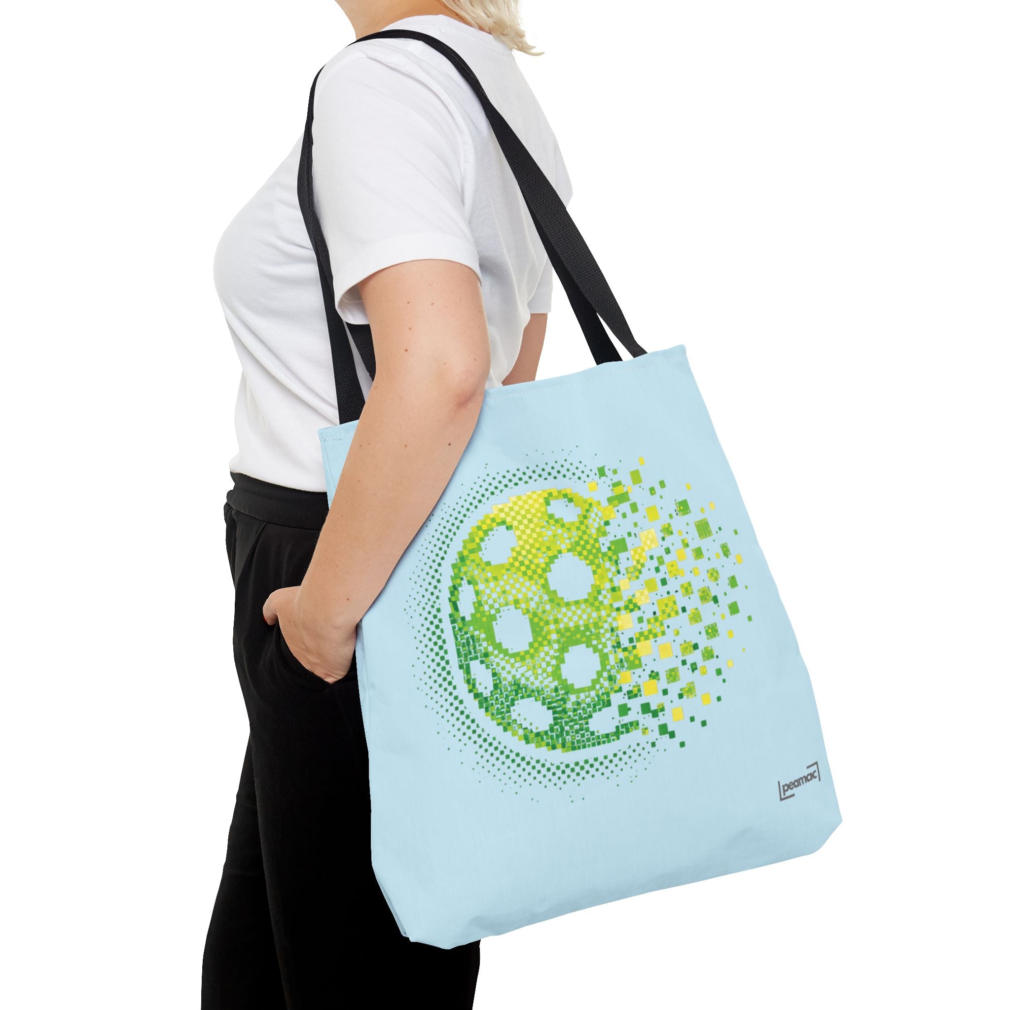 Pixelated pickleball tote bag in green, yellow, and light blue with digital smash design, 18x18 inches, by Printify.