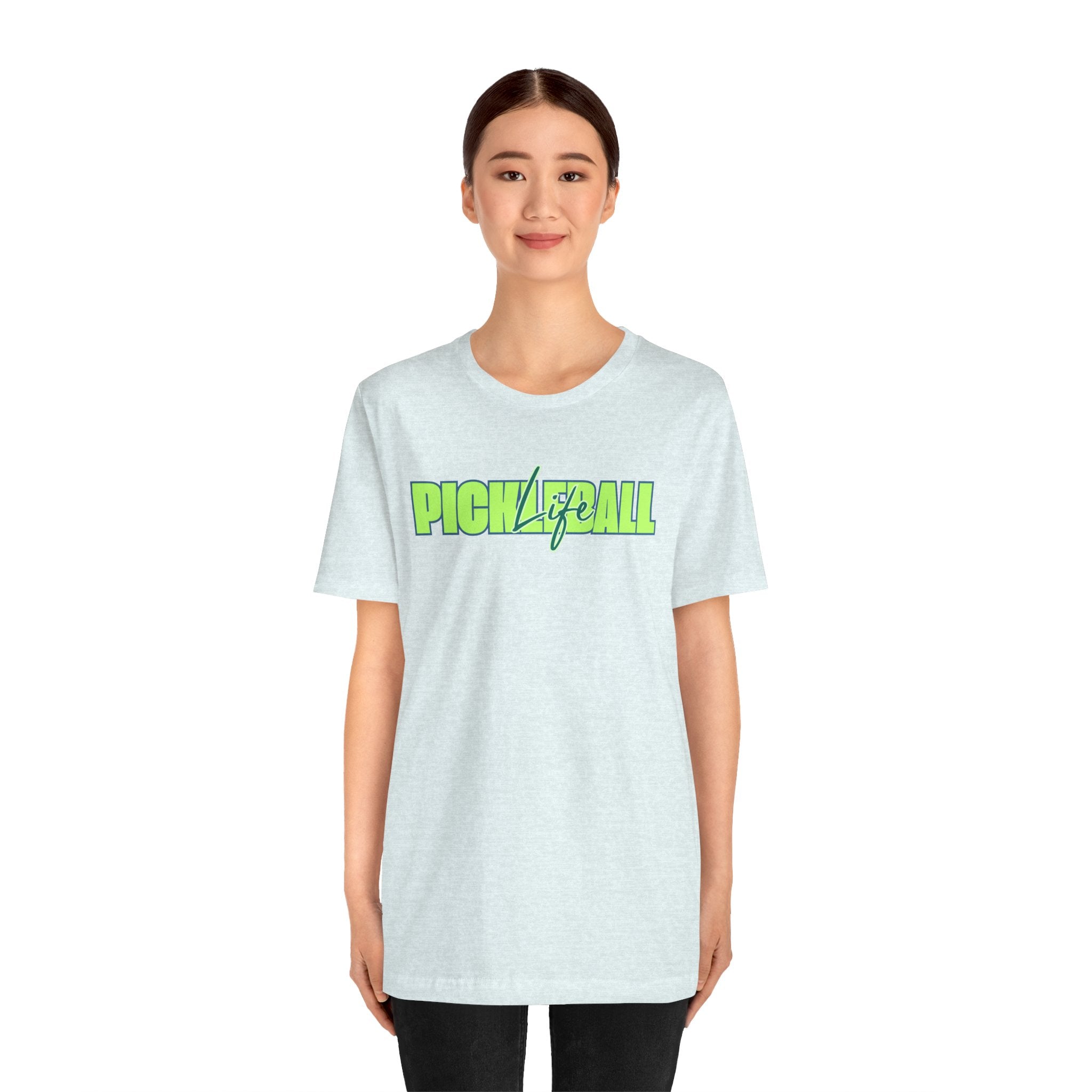 Unisex Pickleball Life T-shirt with bold green and blue graphic print, featuring a casual fit and soft fabric.
