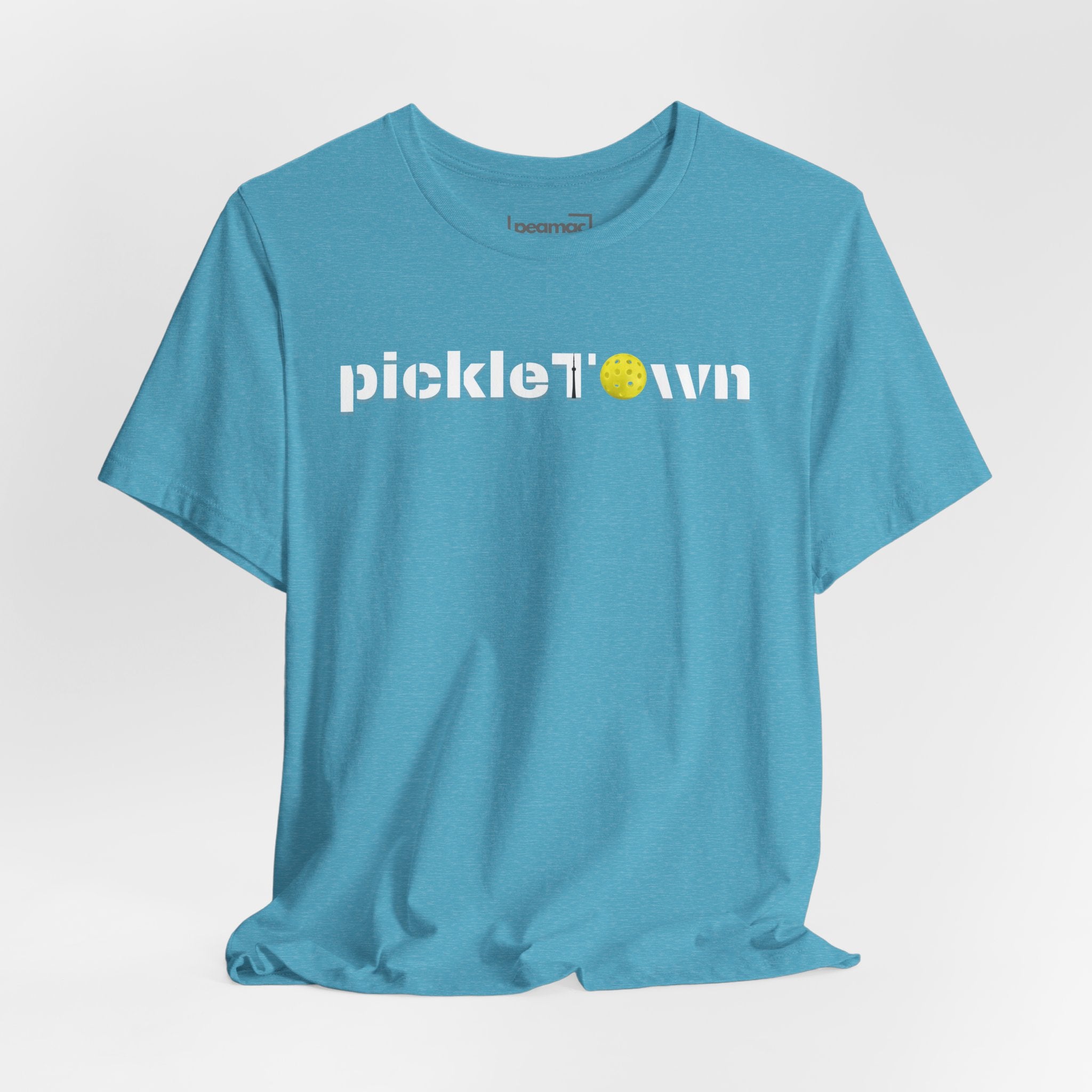 Toronto PickleTOwn T-Shirt featuring CN Tower and Pickleball ‘O’ design, casual unisex tee by Printify.