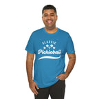 White Classic Pickleball T-Shirt with "Pickleball" script design, casual fit, and printed by Printify.