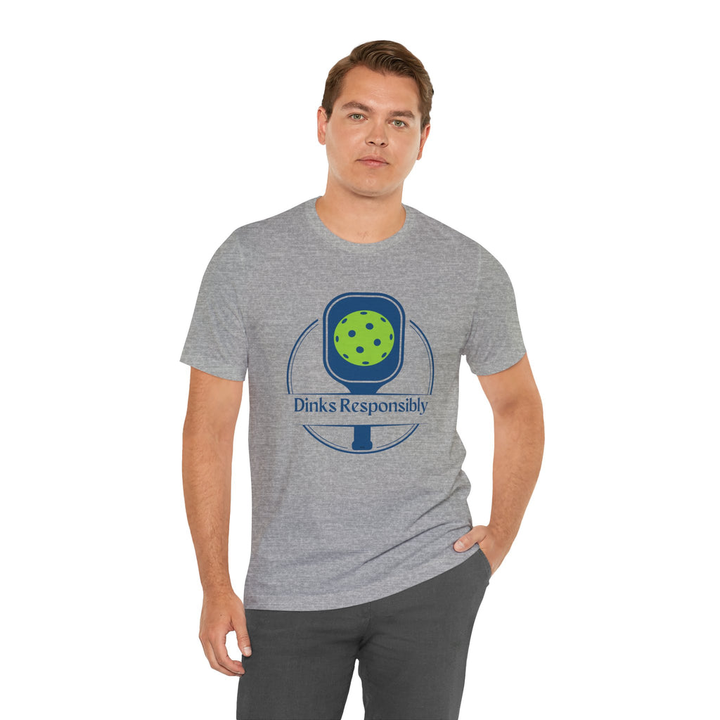 Dinks Responsibly Pickleball T-Shirt with paddle and ball graphic, humorous pickleball shirt by Printify, casual sportswear.
