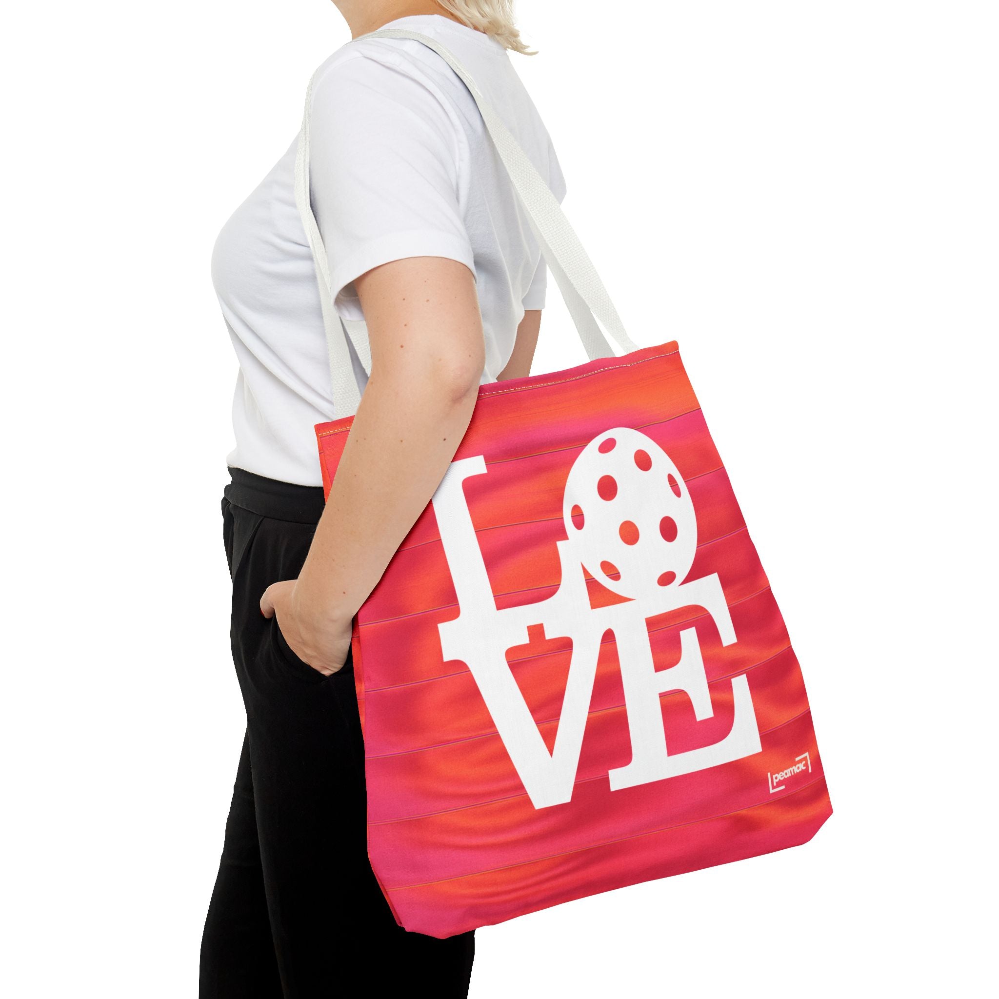 Sporty orange and pink LOVE Pickleball Tote Bag by Printify, large carryall bag with a vibrant, colorful design and spacious interior.