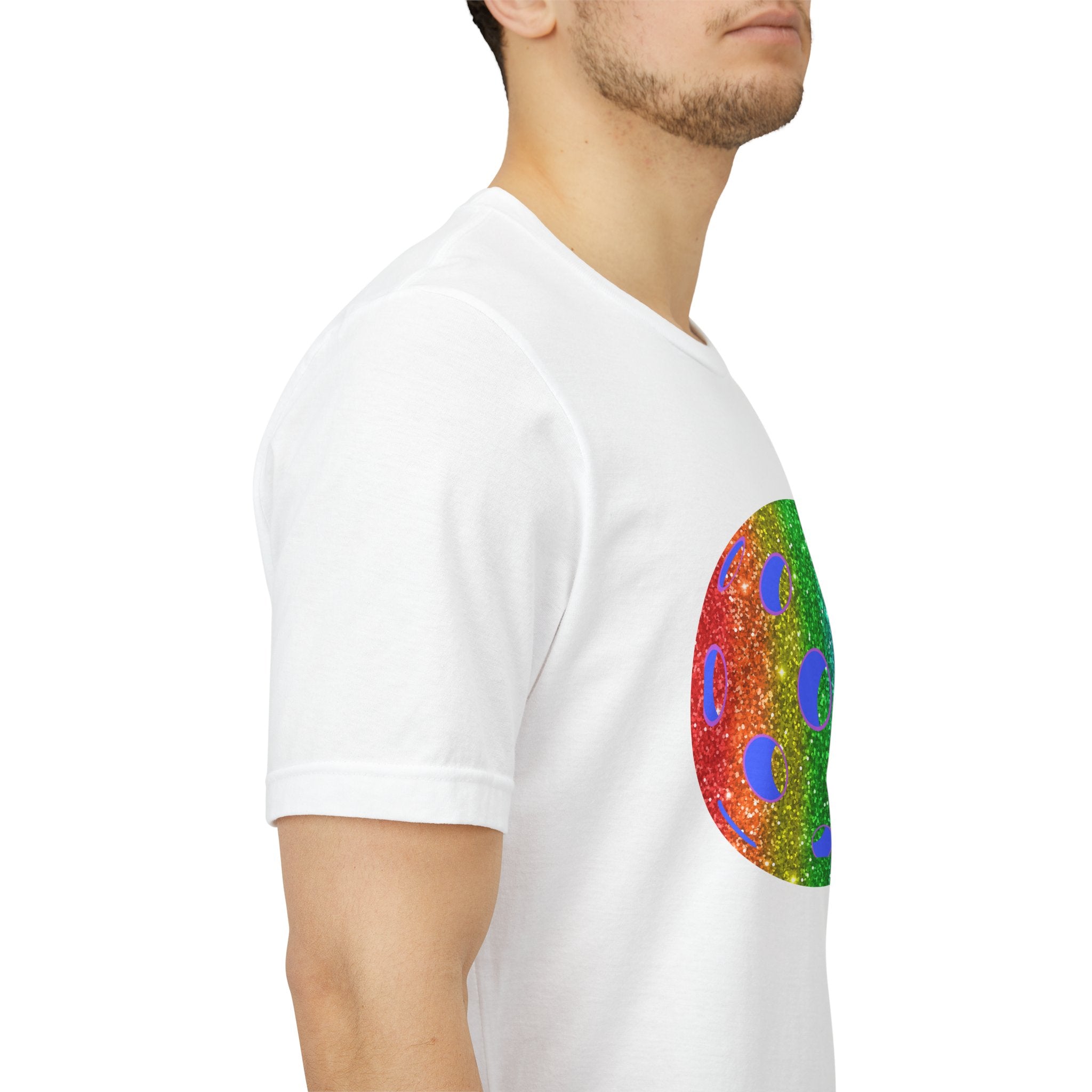 Rainbow glitter pickleball T-shirt with “Sparkle Loud and Proud” slogan, celebrating pride and inclusivity in vibrant colors.