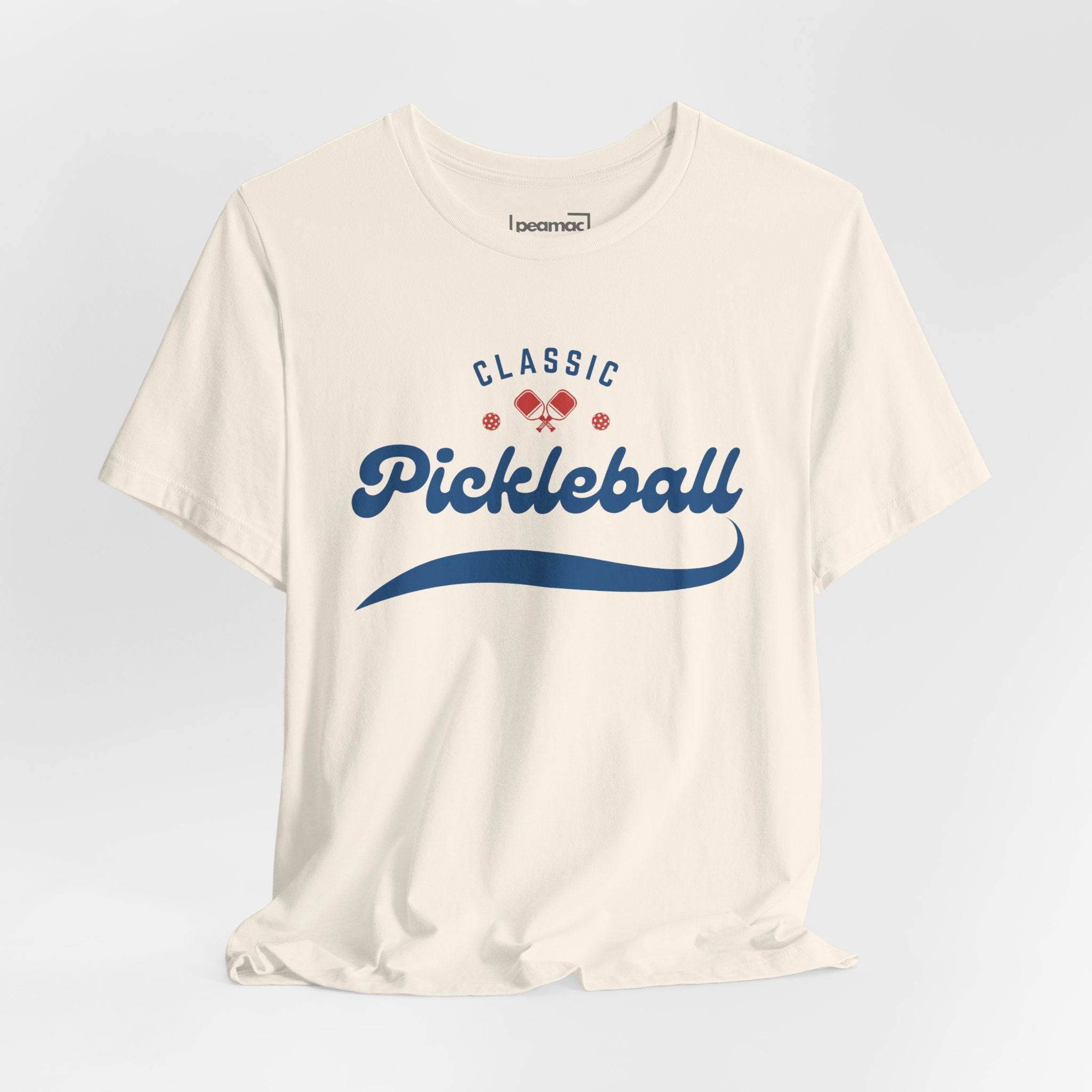 Red and blue pickleball T-shirt with paddle and ball graphic, featuring the Classic Pickleball Script design on a casual print tee.