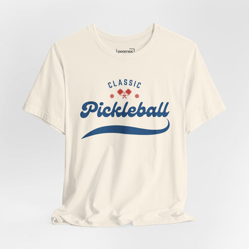 Red and blue pickleball T-shirt with paddle and ball graphic, featuring the Classic Pickleball Script design on a casual print tee.