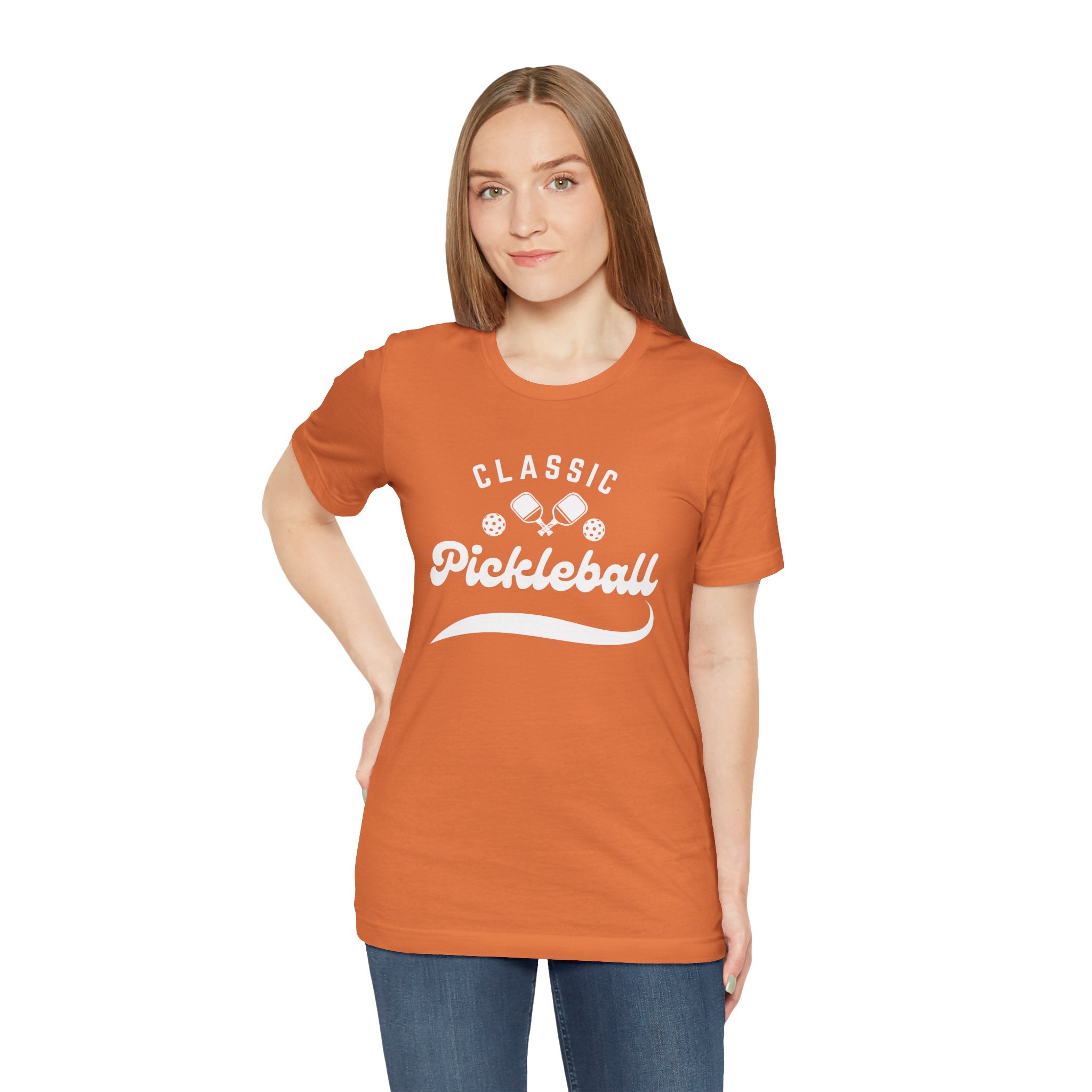 White pickleball T-shirt with "Pickleball" script design, casual fit, from Printify, ideal for pickleball players and enthusiasts.