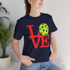 Bright neon pop art design on the LOVE Pickleball T-Shirt by Printify, featuring a vibrant and stylish premium cotton tee.