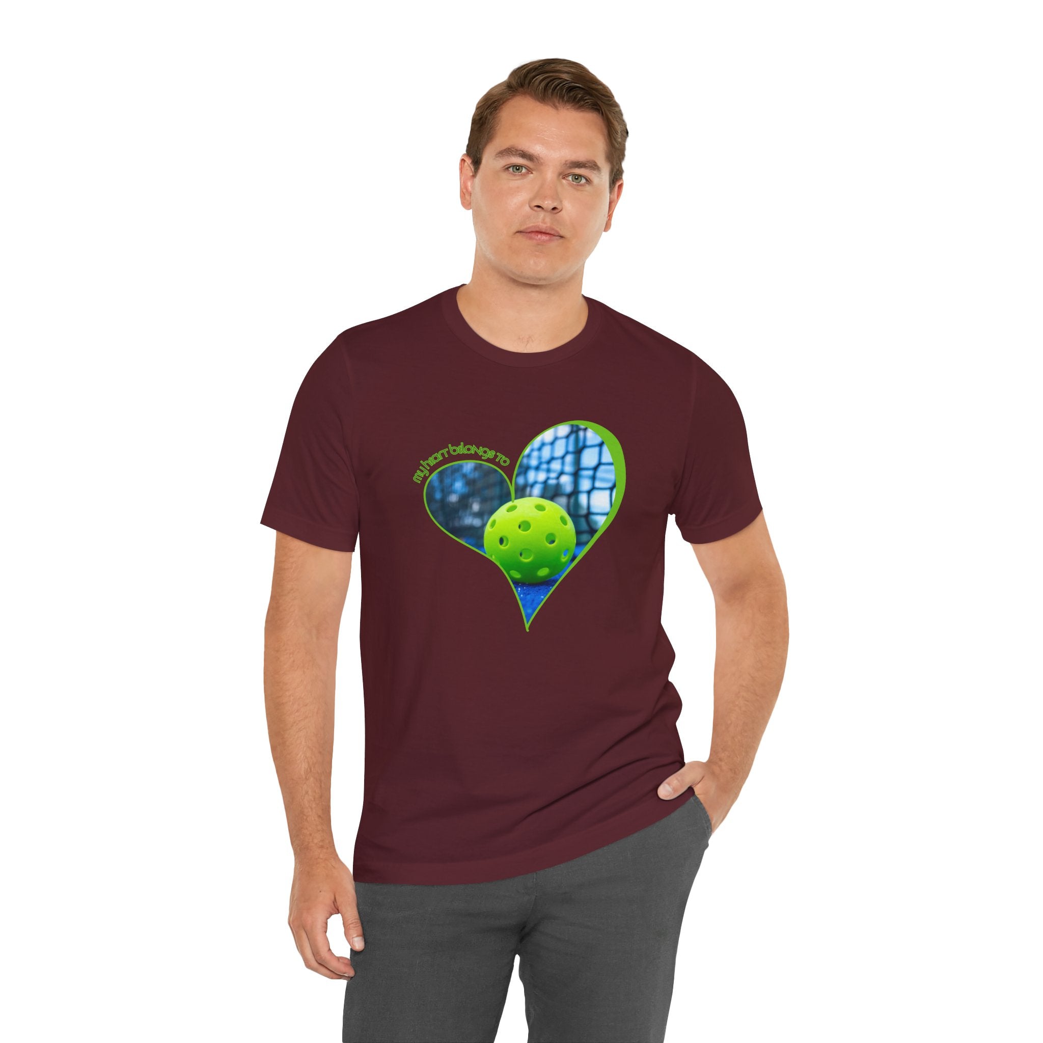 White pickleball T-shirt for players and fans with "My Heart Belongs to Pickleball" text, by Printify.