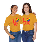 Rainbow LGBTQ2 pride T-shirt with "LOVE Pickleball" graphic, casual unisex tee made by Printify, featuring vibrant colors and bold design.