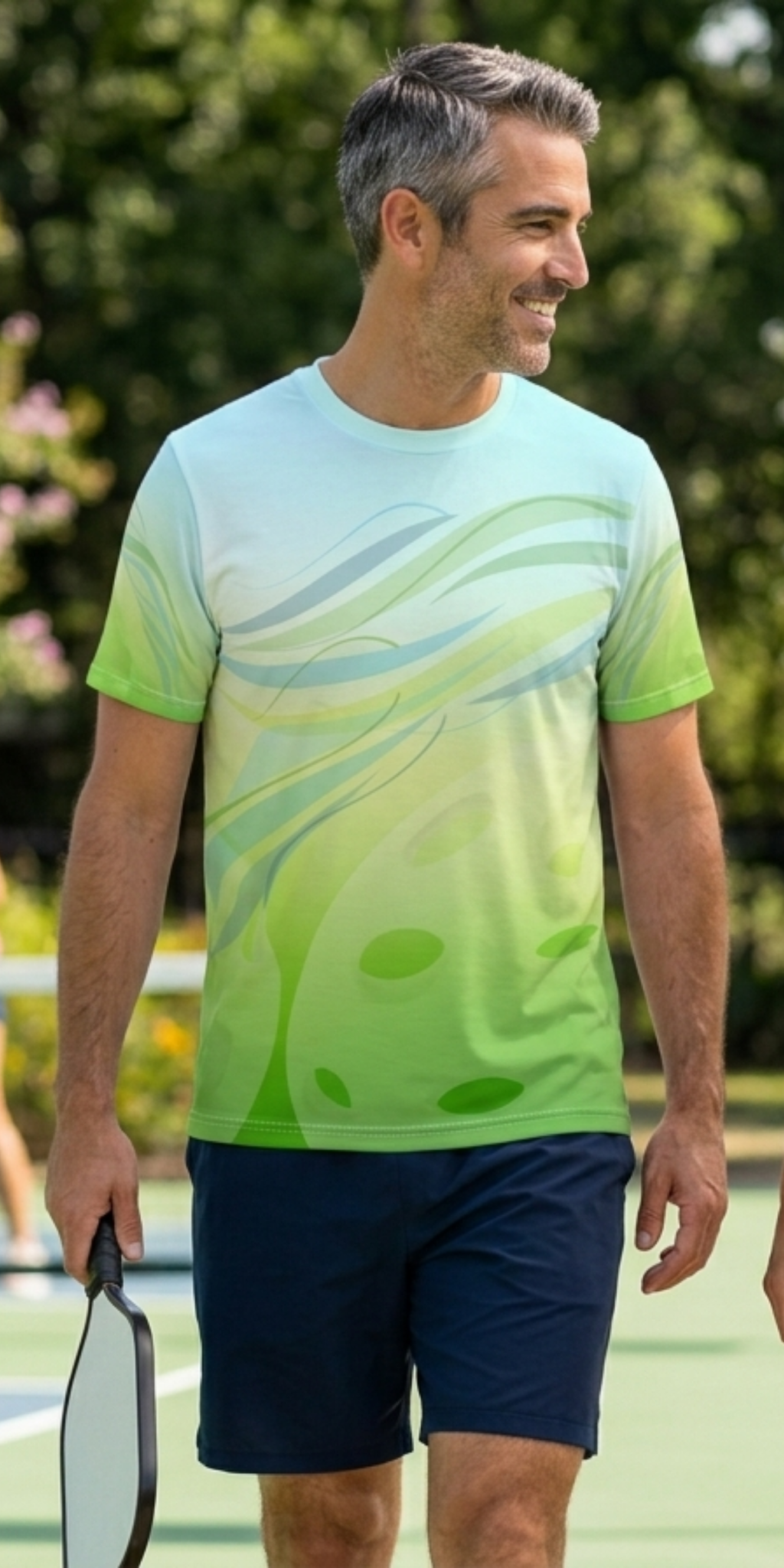 Unisex Pickleball Summer Breeze Tee with green leaf wave all-over print, moisture-wicking fabric from Printify