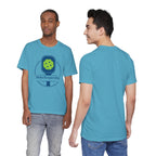 Dinks Responsibly Pickleball T-shirt with paddle and ball graphic, humorous pickleball shirt by Printify.