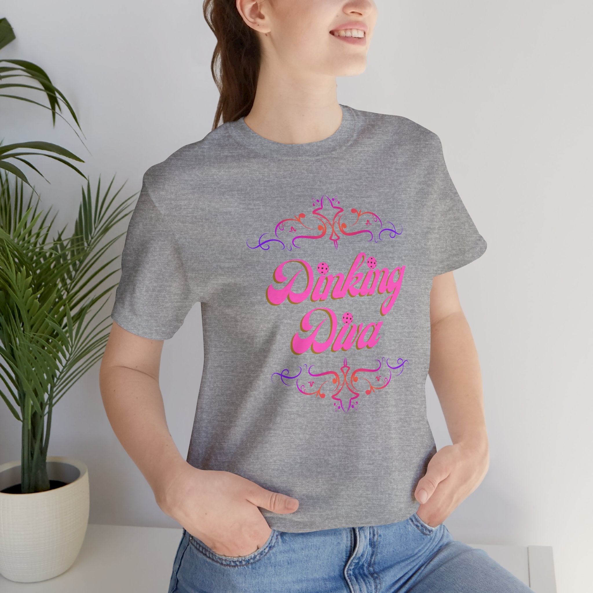 Pink Dinking Diva Pickleball T-Shirt with filigree design, athletic fit, by Printify, featuring a stylish and comfortable sports tee.