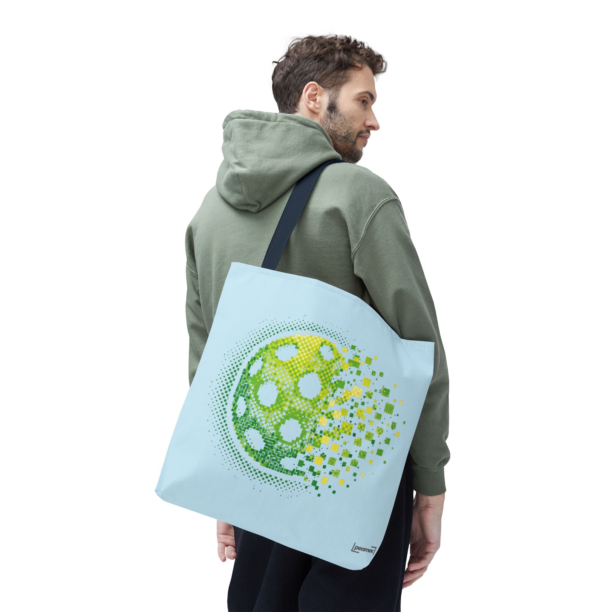 Pixelated pickleball tote bag in green, yellow, and light blue with digital smash design, 18x18 inches, by Printify.