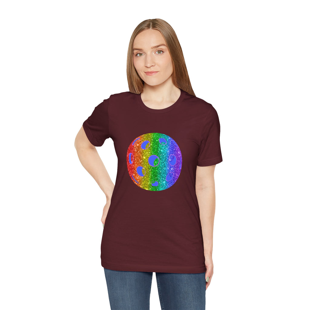 Rainbow glitter pickleball pride T-shirt from Printify featuring bold "Sparkle Loud and Proud" design on a colorful tee.