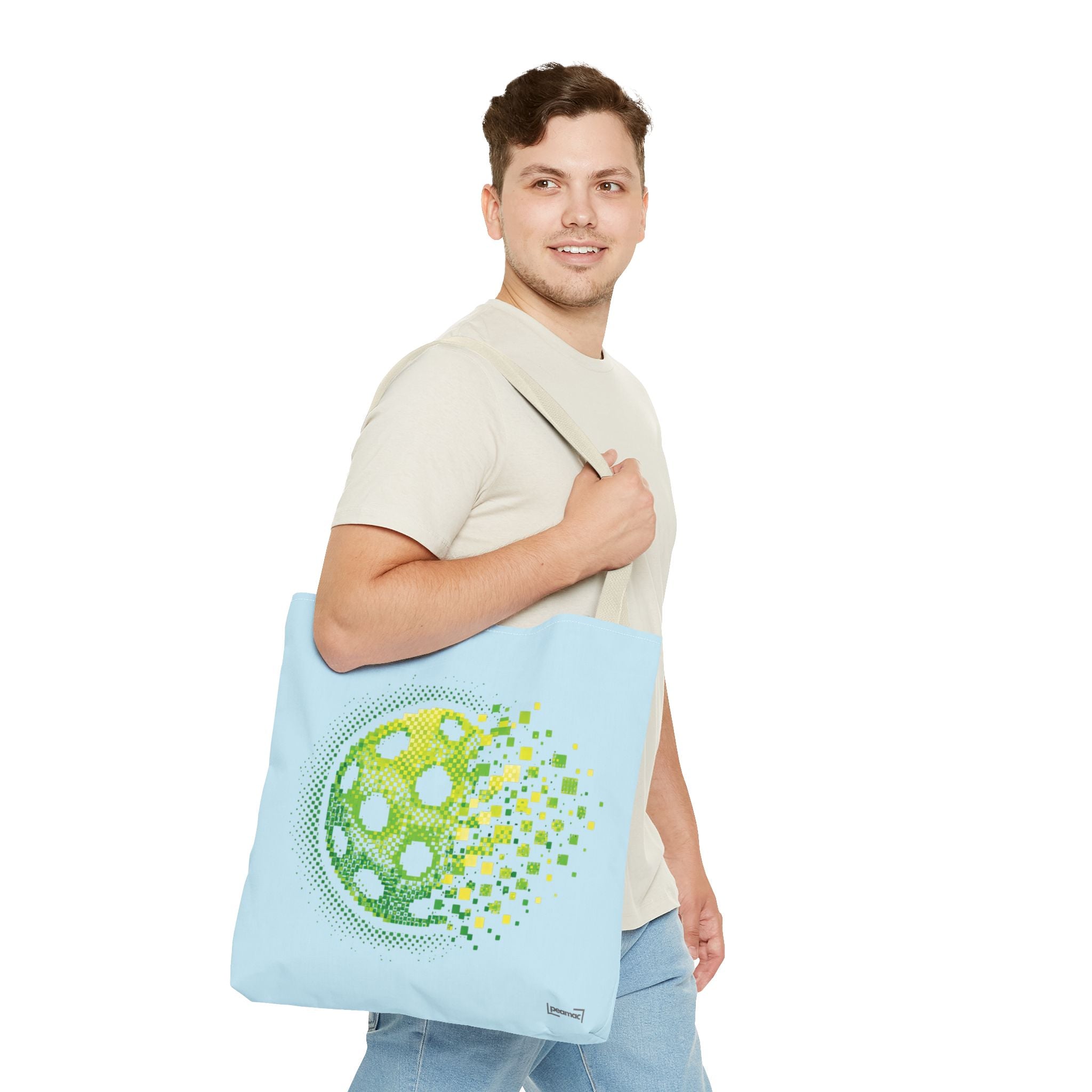Pixelated pickleball tote bag in green, yellow, and light blue with digital smash design, 18x18 inches, by Printify.
