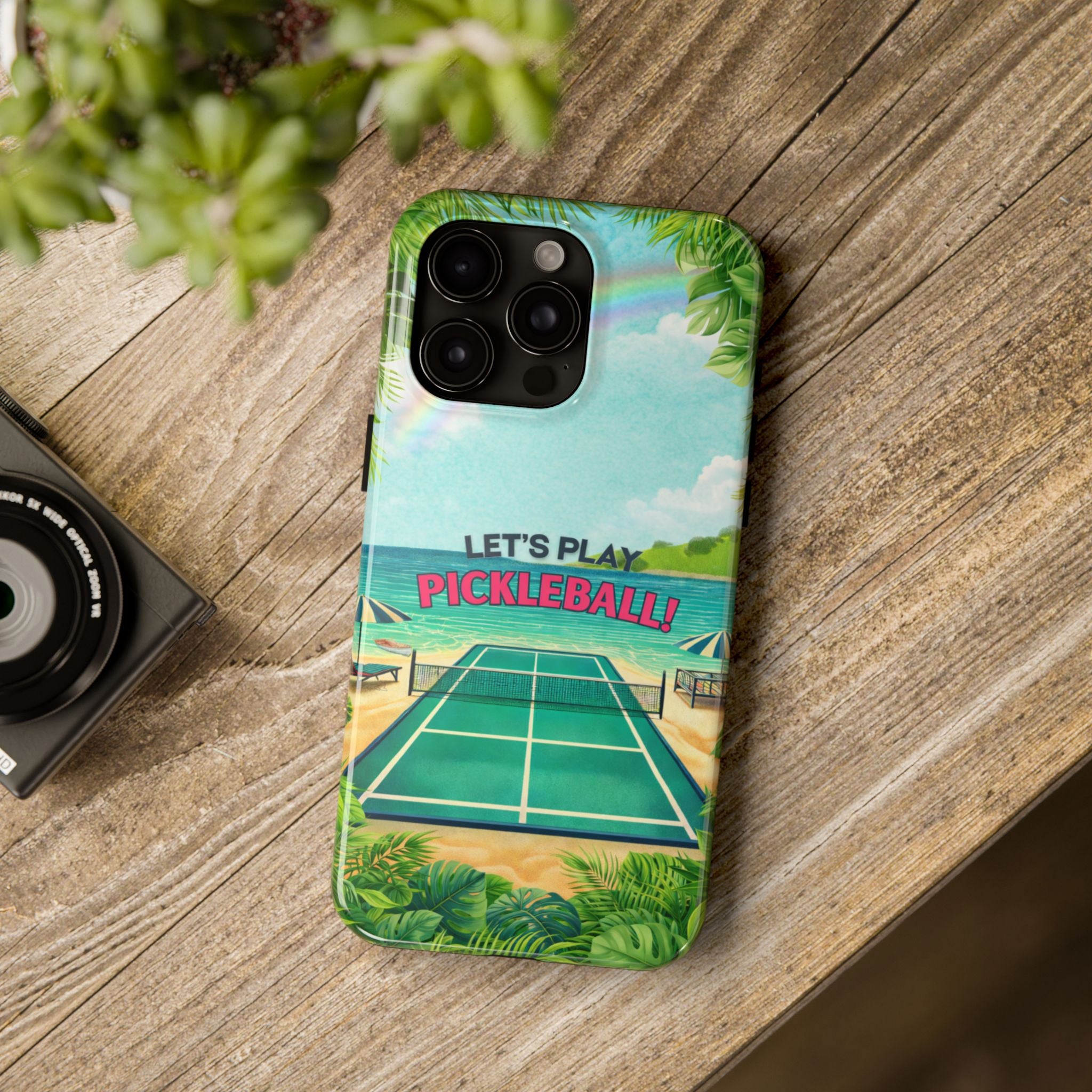 Tropical-themed Let's Play Pickleball tough phone case by Printify featuring beach court design for iPhone and Android models