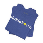 Toronto PickleTOwn T-Shirt featuring CN Tower and Pickleball ‘O’ design, casual unisex tee by Printify.