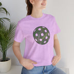 Pickleball Word Cloud T-Shirt with pickleball-shaped graphic, featuring words like dink, pick, and kitchen on a casual shirt.