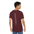 Personalized pickleball T-shirt with custom name sleeve, club logo, and pickleball graphic on the center back by Printify.
