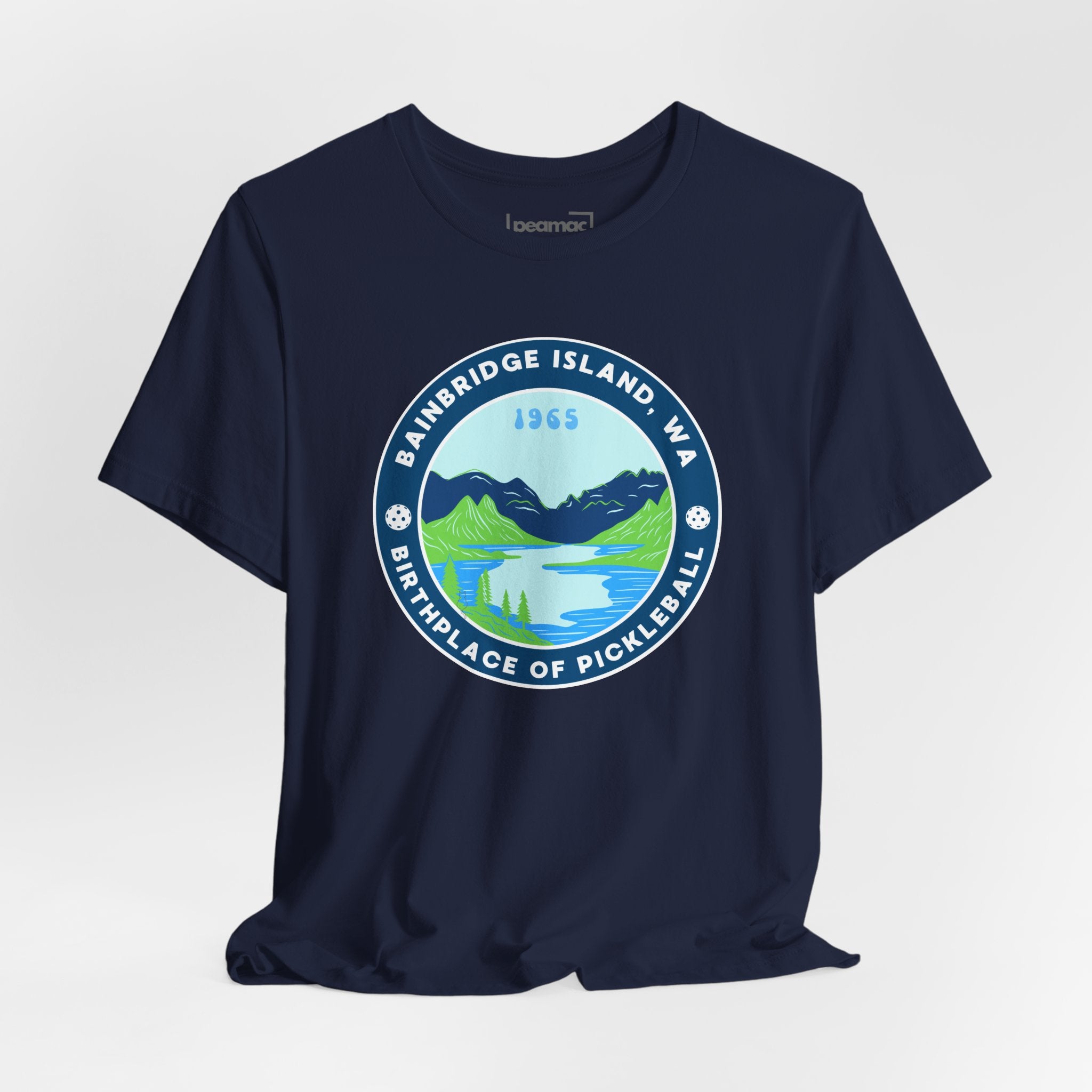 Unisex Bainbridge Island Pickleball T-Shirt with "Birthplace of Pickleball 1965" text, featuring a casual fit and printed design.