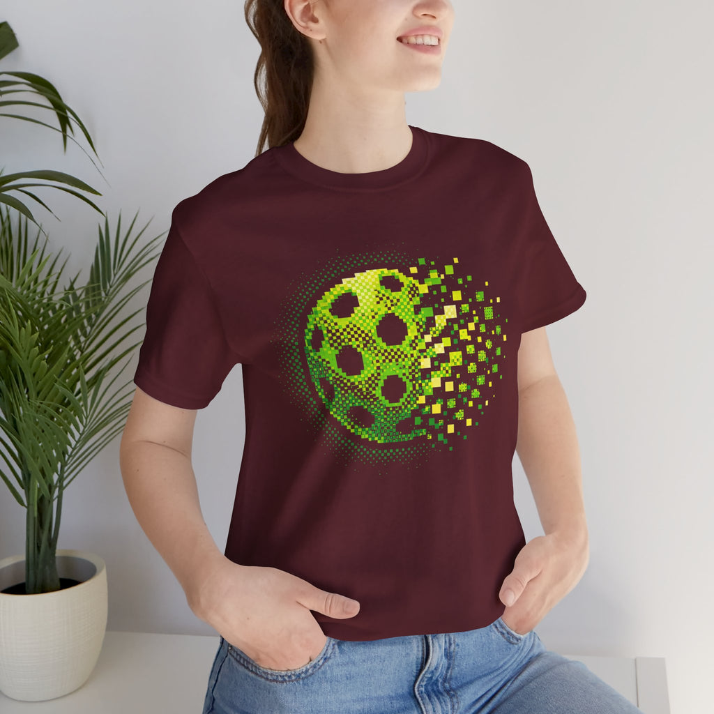 Green Pixelated Pickleball Tee with retro court graphic, casual t-shirt by Printify featuring colorful pickleball design.