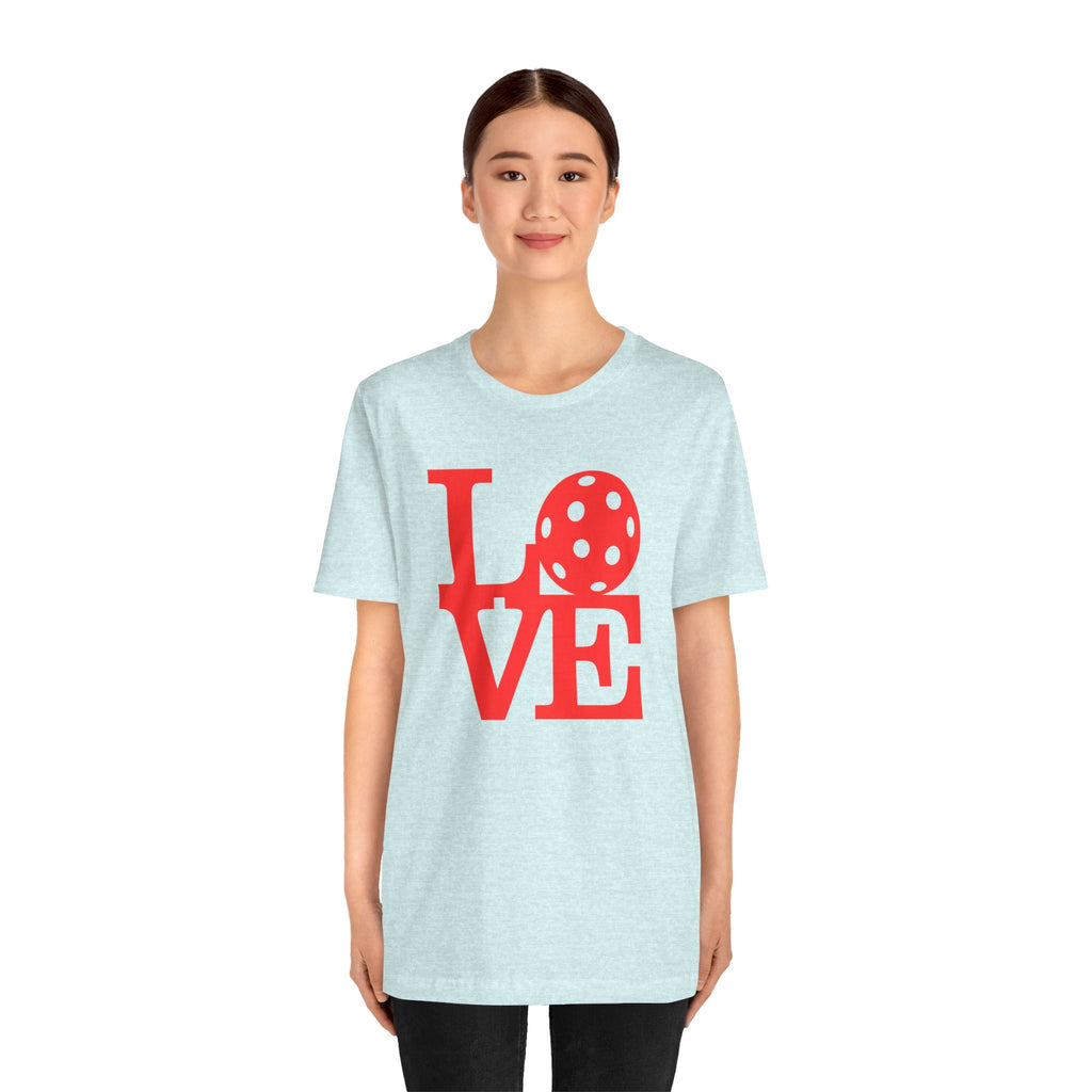 Bold red LOVE Pickleball graphic T-shirt by Printify featuring pop art design, casual unisex fit, perfect for pickleball enthusiasts.