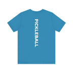 Men's Retro Pickleball Action Tee with dynamic front silhouette and vertical 'PICKLEBALL' lettering on the back, by Printify.