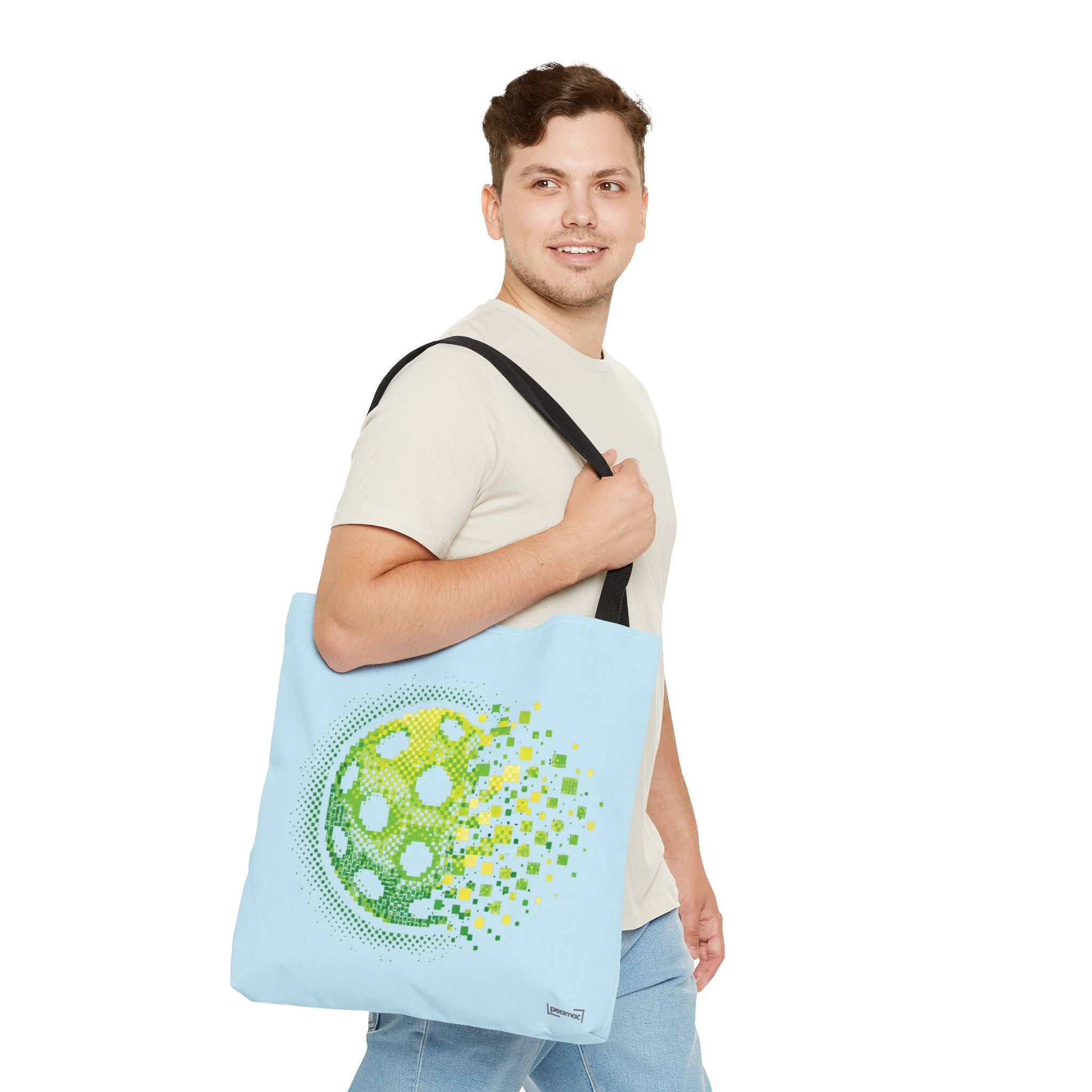 Pixelated pickleball tote bag in green, yellow, and light blue with digital smash design, 18x18 inches, by Printify.