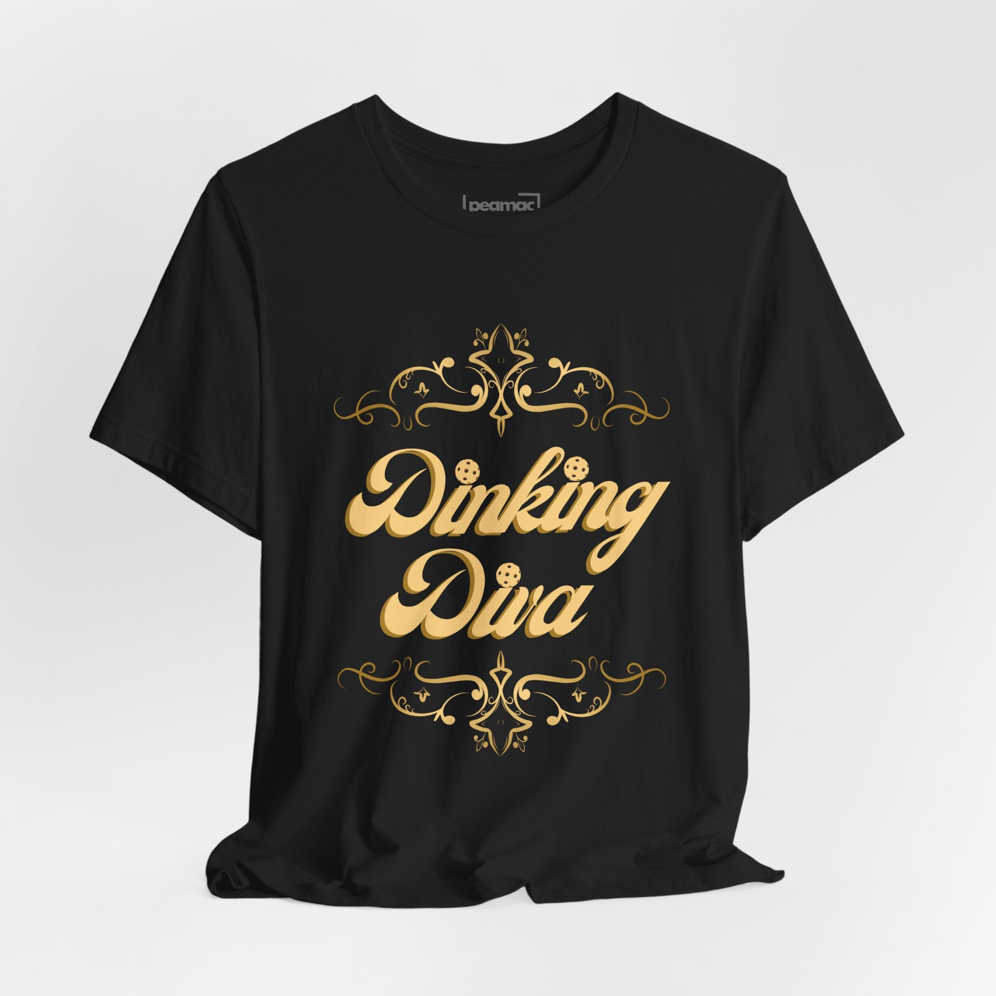 Dinking Diva pickleball T-shirt with gold filigree design, comfortable cotton fabric, and casual fit.