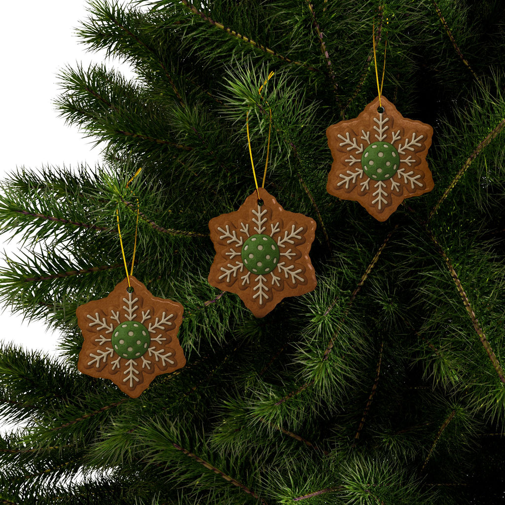 Set of four pickleball-themed Christmas ornaments in gingerbread style, festive holiday decor for home and gift-giving.