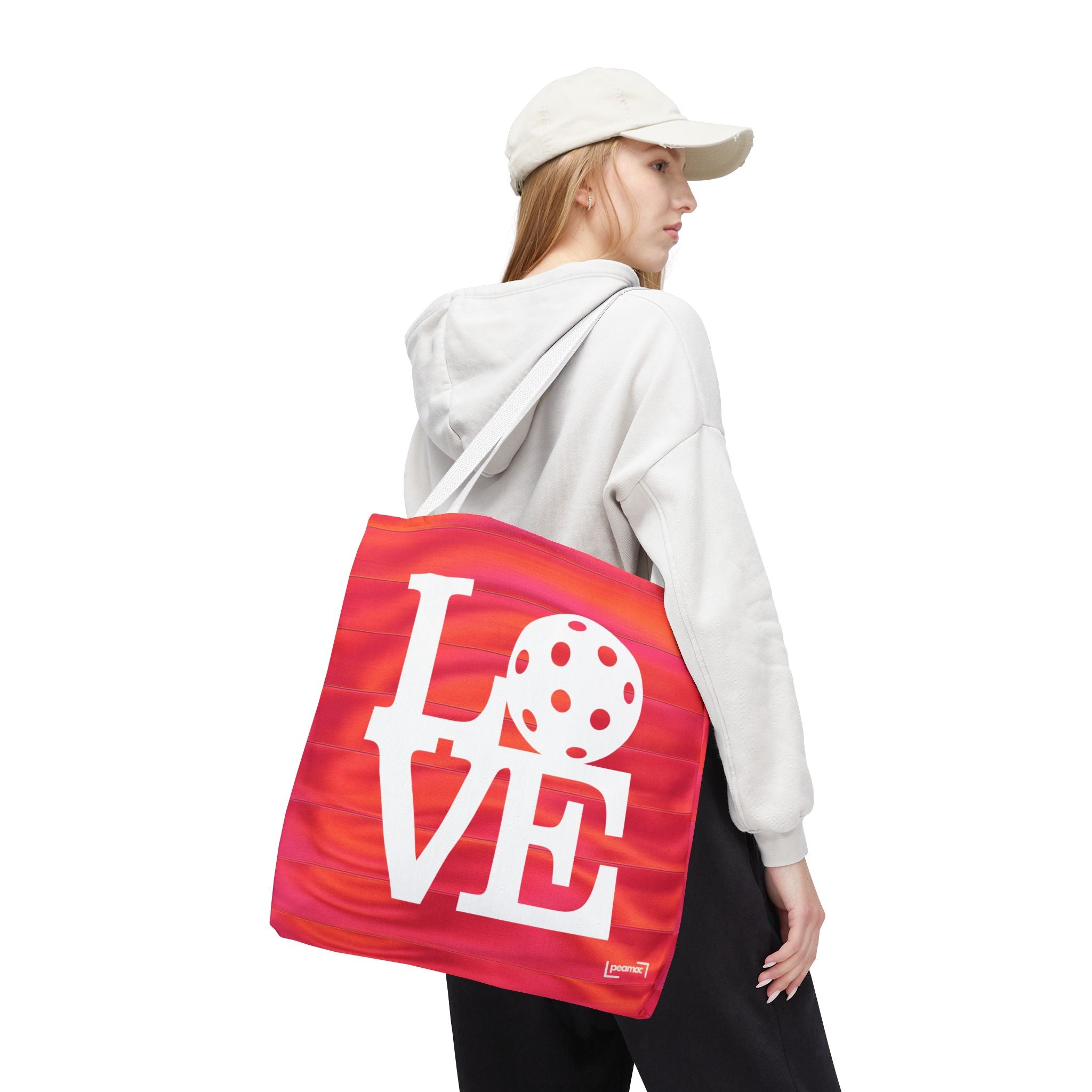 Large sporty orange and pink tote bag for pickleball from Printify, featuring a spacious design and vibrant color pattern.
