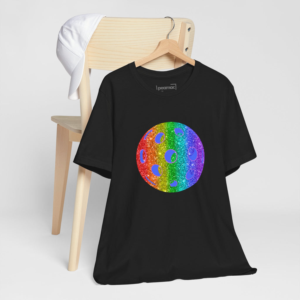 Rainbow glitter pickleball Pride T-shirt featuring colorful design, casual fit, and bold "Loud and Proud" slogan for pride events.