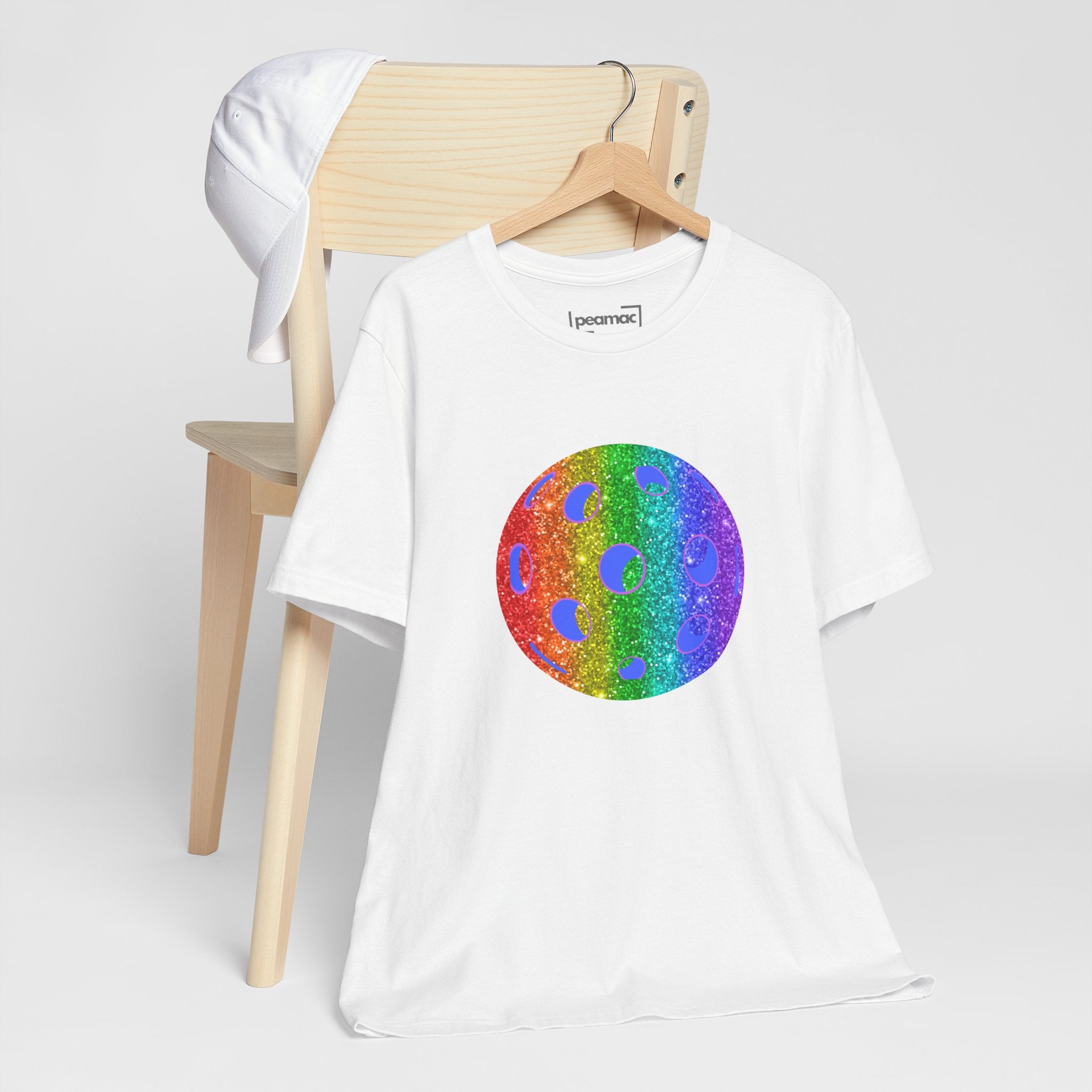 Rainbow glitter pickleball pride T-shirt by Printify featuring a colorful design celebrating LGBTQ+ pride and pickleball enthusiasm.