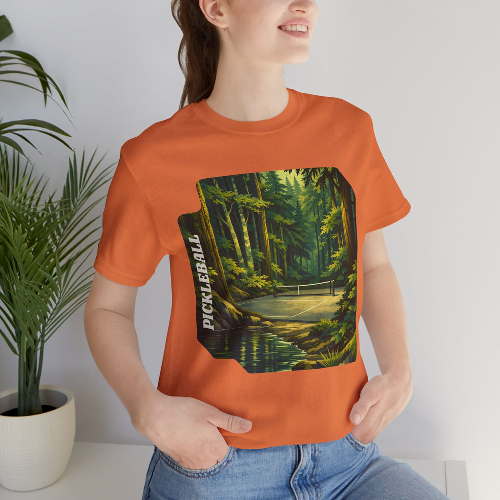 Unisex Hidden Forest Pickleball T-Shirt with Bainbridge Island tribute design, featuring a casual fit and forest-inspired graphic.