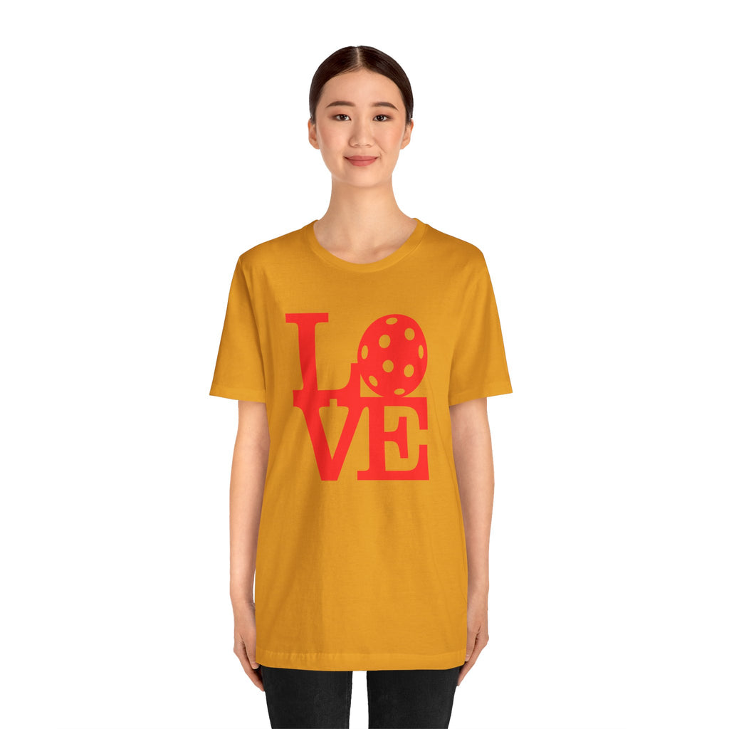 Red LOVE Pickleball graphic T-shirt by Printify featuring bold pop art design, casual fit, perfect for pickleball enthusiasts.