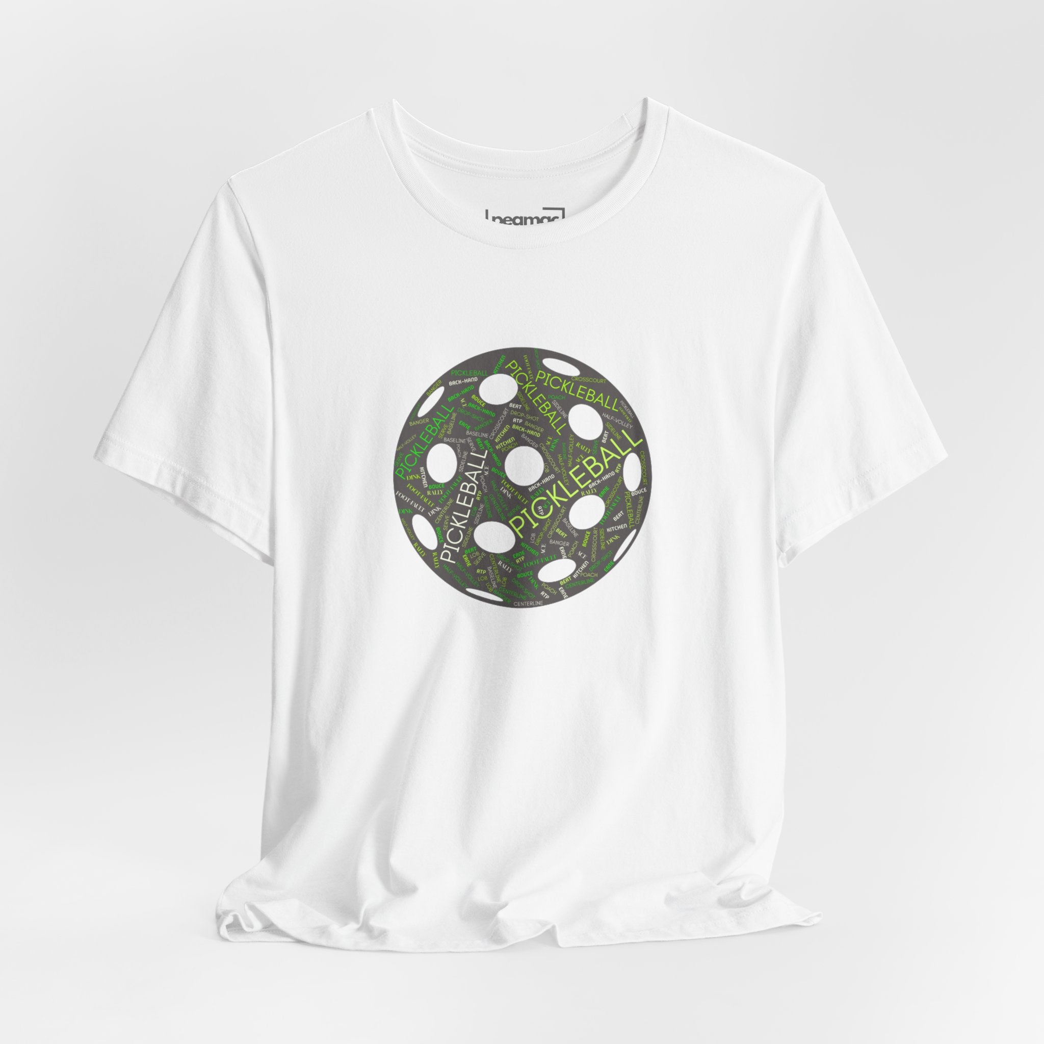 Pickleball Word Cloud T-Shirt with pickleball-shaped graphic featuring words like Dink, Pickle, and Kitchen on a casual tee.