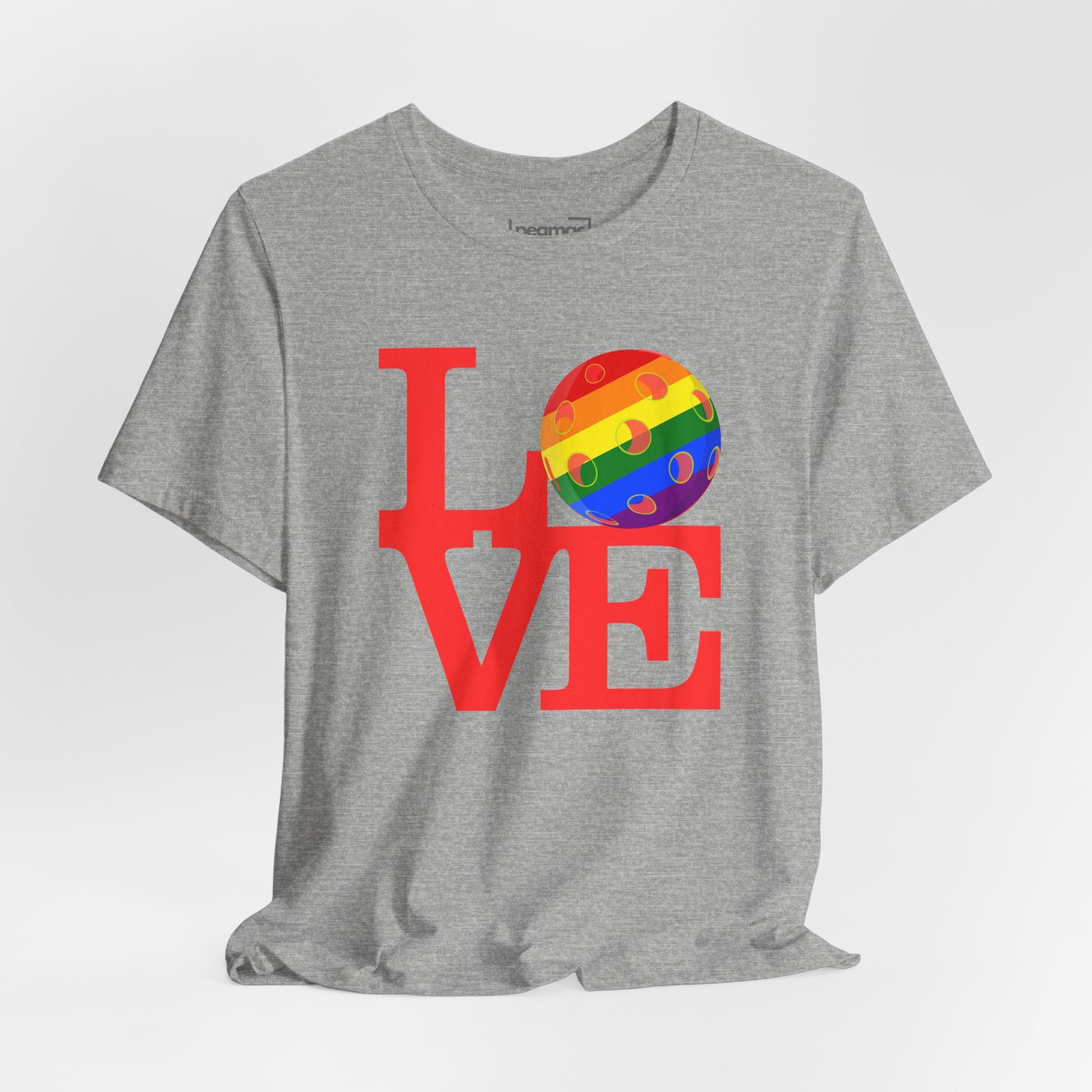 Love Pickleball Pride T-Shirt featuring rainbow LGBTQ2 design, comfortable cotton fabric, and bold colorful print for inclusive style.