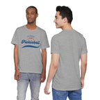 Red and blue pickleball script tee featuring paddle and ball design, casual unisex T-shirt by Printify.