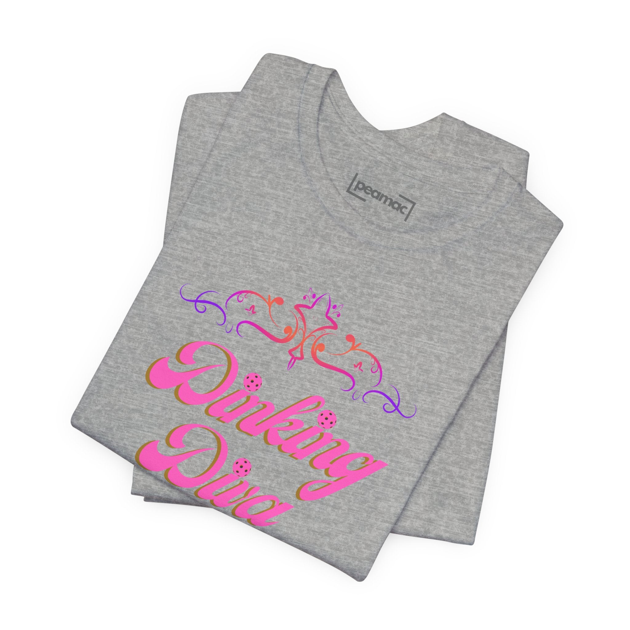 Pink Dinking Diva pickleball T-shirt by Printify featuring a stylish filigree design on athletic fabric.