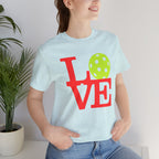 Neon pop art Love Pickleball T-shirt by Printify featuring bright colors and bold design on a premium cotton tee.