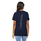 Personalized pickleball T-shirt featuring custom name and club logo with paddle graphic, by Printify.